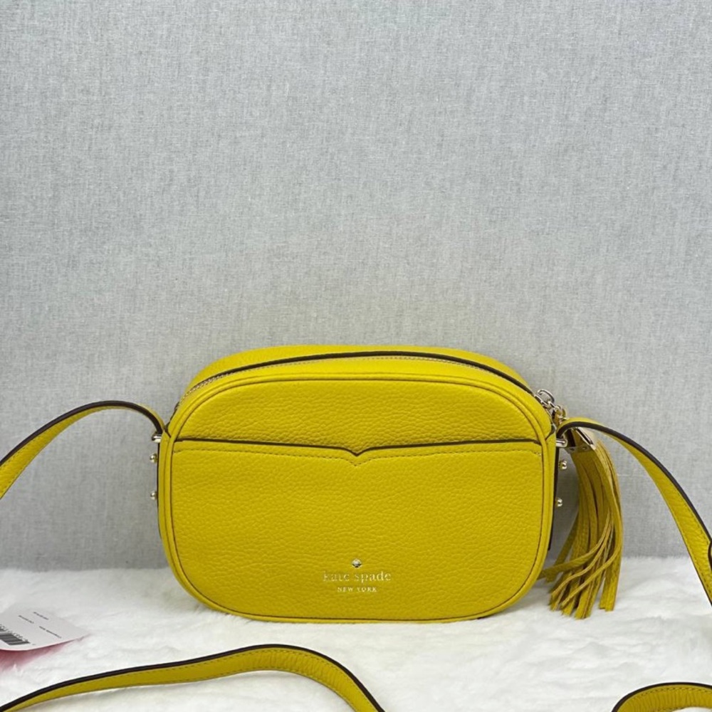 Yellow Kate Spade cross body bag